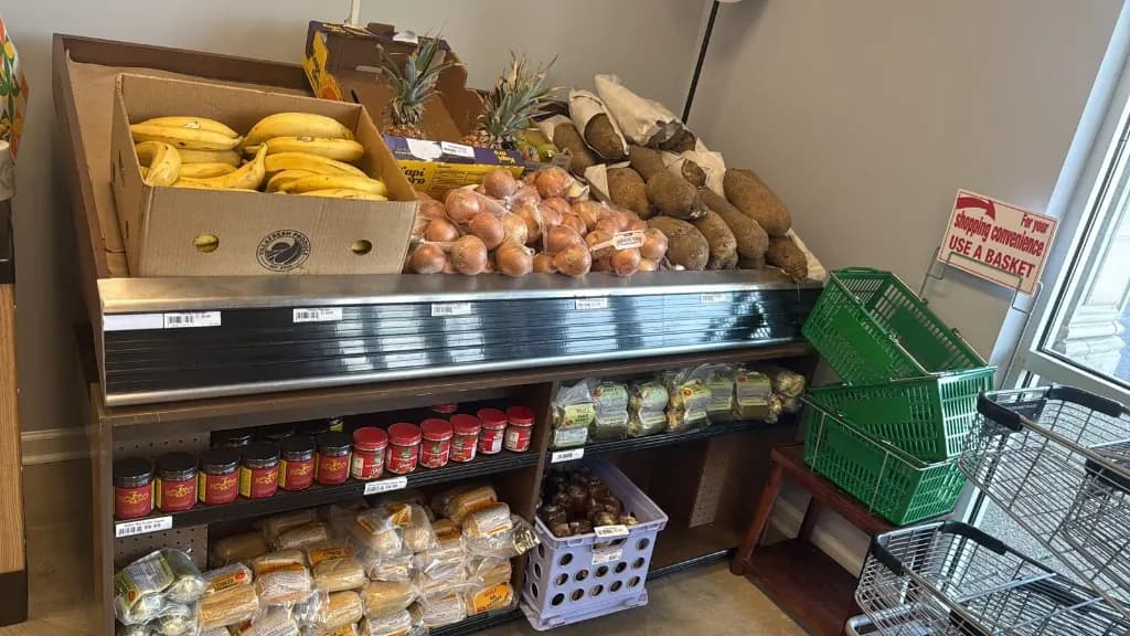 Fresh produce including plantain, yam, and pineapple